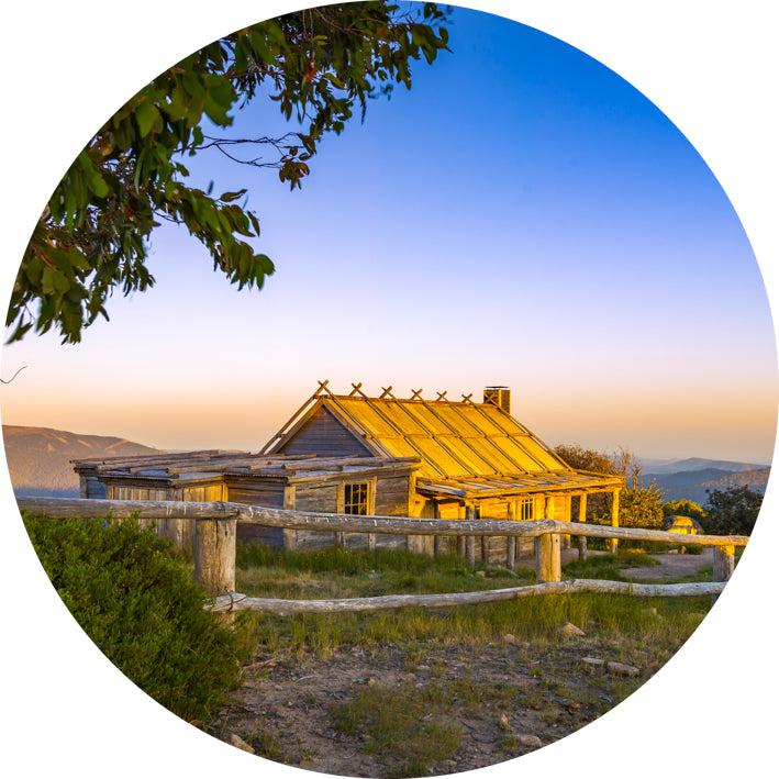 Craig's Hut Sunrise (Round) Jigsaw Puzzle by Artist Jaime Dormer and Manufactured by QPuzzles in Queensland