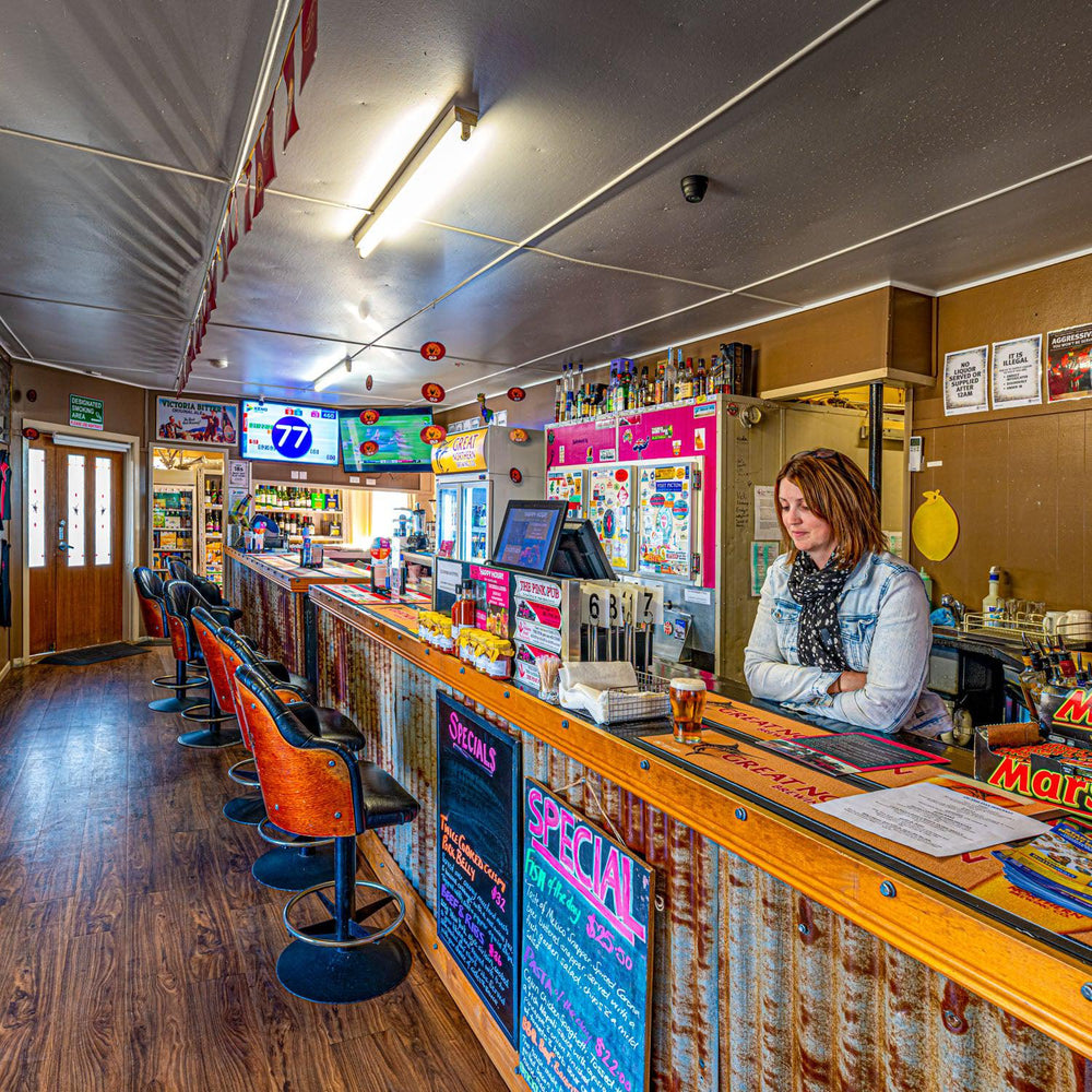 Dulacca Pink Hotel (Square) Jigsaw Puzzle by Artist Jaime Dormer and Manufactured by QPuzzles in Queensland