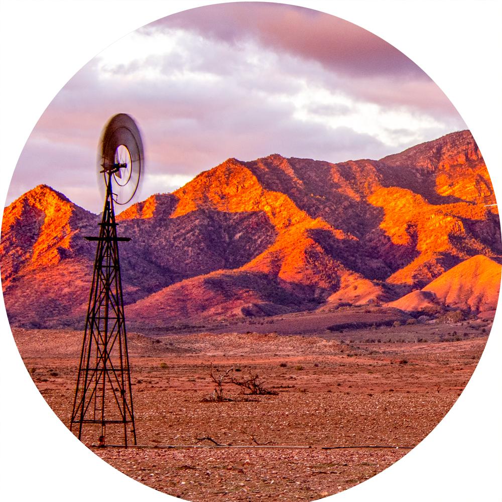 Moralana Mill Sunset (Round) Jigsaw Puzzle by Artist Jaime Dormer and Manufactured by QPuzzles in Queensland