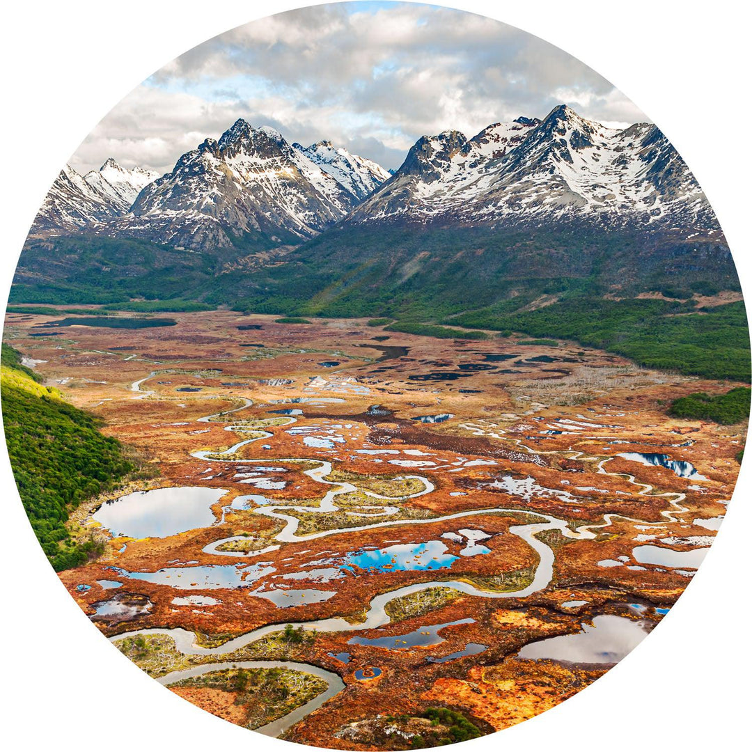 River Below the Andes (Round) Jigsaw Puzzle by Artist Jaime Dormer and Manufactured by QPuzzles in Queensland