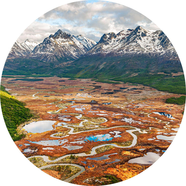 River Below the Andes (Round) Jigsaw Puzzle by Artist Jaime Dormer and Manufactured by QPuzzles in Queensland